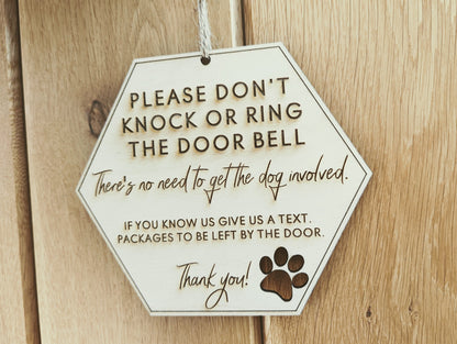 Please don't knock or ring the doorbell don't disturb the dog sign. Don't disturb the dog, our dog will bark sign.