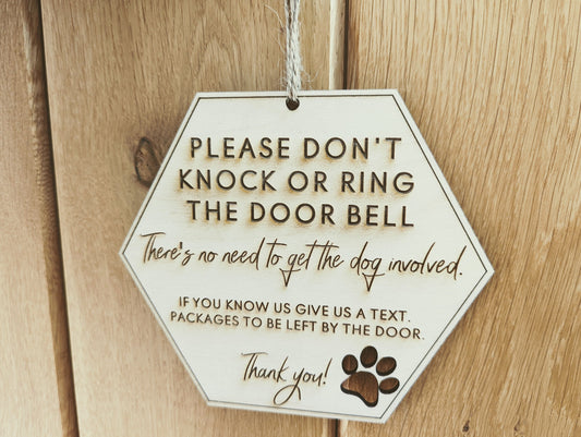 Please don't knock or ring the doorbell don't disturb the dog sign. Don't disturb the dog, our dog will bark sign.