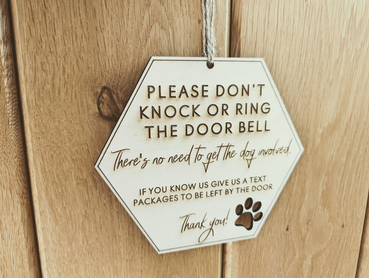 Please don't knock or ring the doorbell don't disturb the dog sign. Don't disturb the dog, our dog will bark sign.