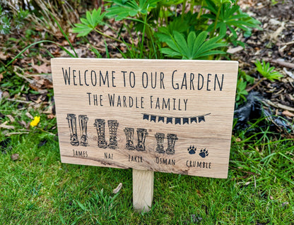 Welcome to our garden wellies family oak sign with wood stake. Personalised garden plaque with stake with family names and pets and wellies