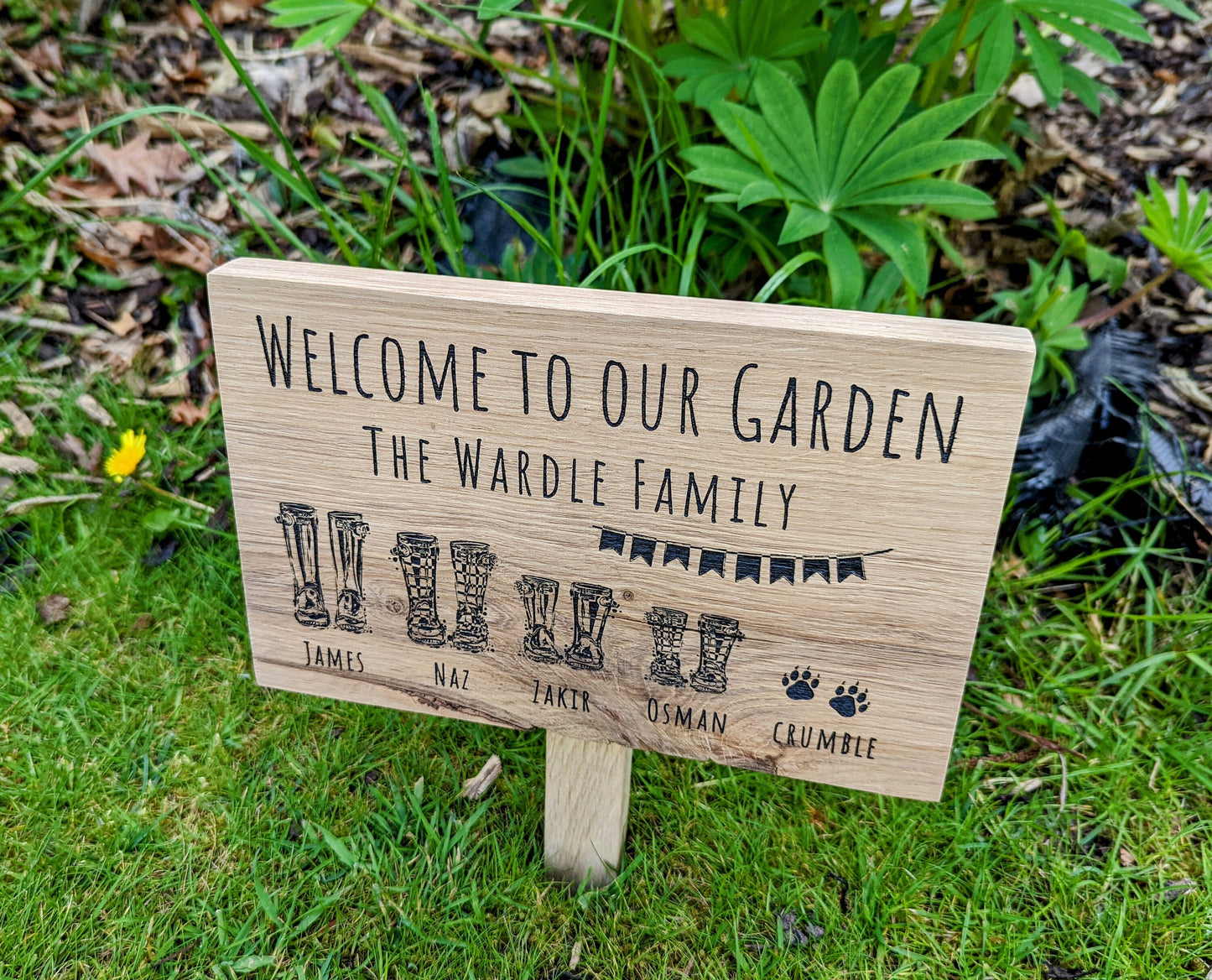 Welcome to our garden wellies family oak sign with wood stake. Personalised garden plaque with stake with family names and pets and wellies