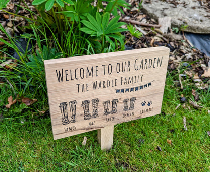 Welcome to our garden wellies family oak sign with wood stake. Personalised garden plaque with stake with family names and pets and wellies