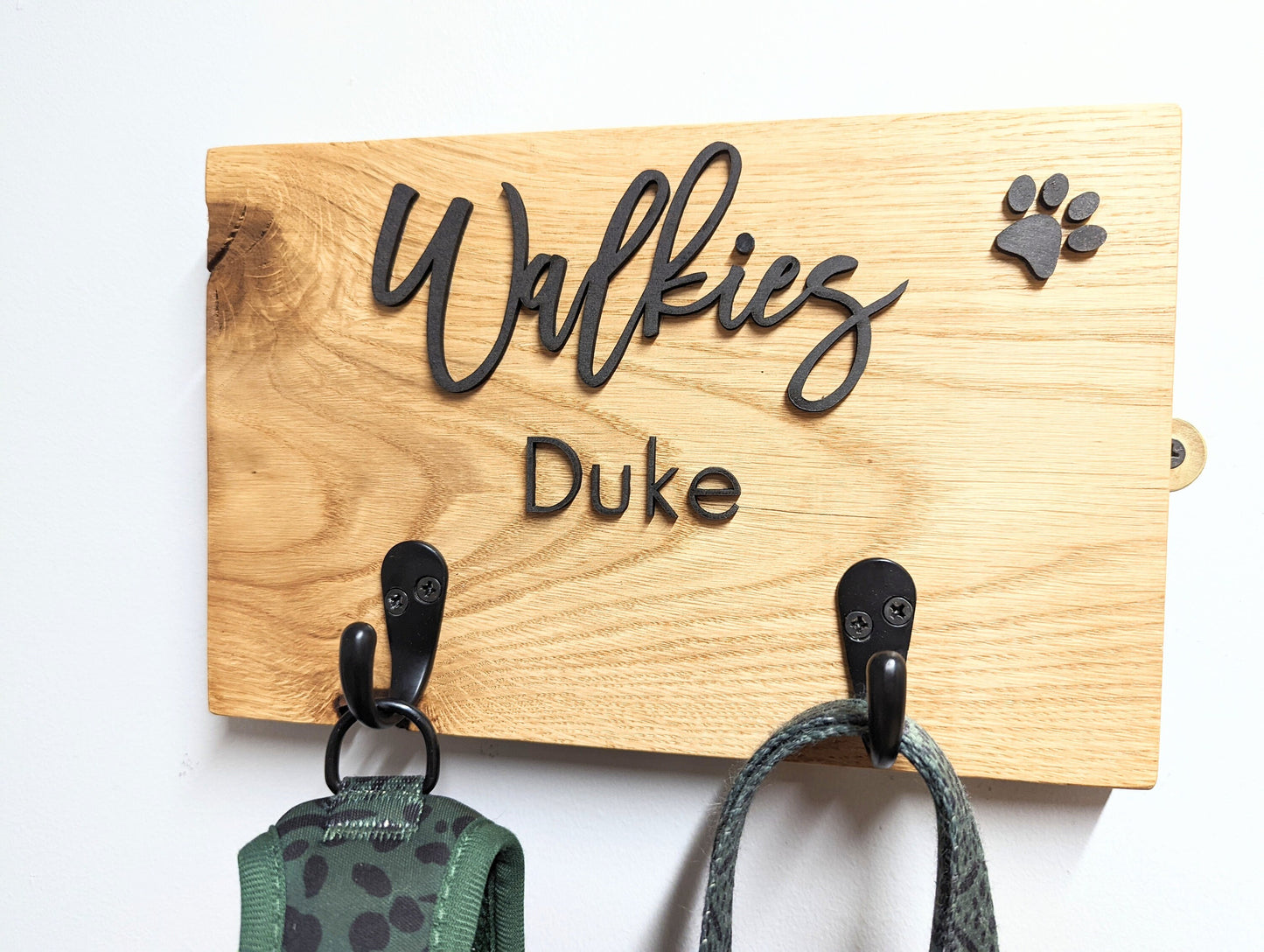 Personalised Walkies dog lead hook sign with oak base and the dog/s name with two hooks. Dog lead hook oak plaque with wording Walkies