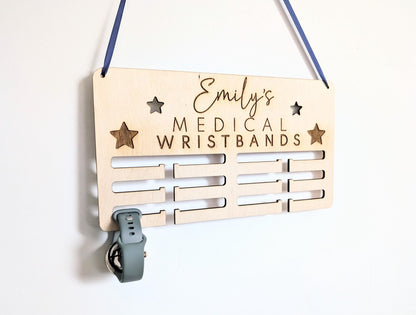 Personalised medical wristband holder. Wooden wall medical wristband hanger. Personalised holder for medical wristbands and bracelets.