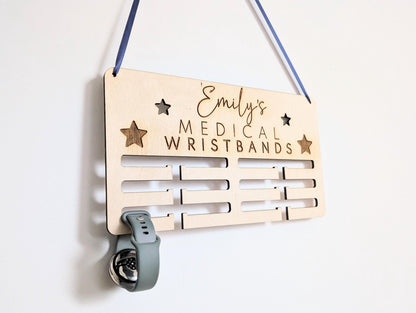 Personalised medical wristband holder. Wooden wall medical wristband hanger. Personalised holder for medical wristbands and bracelets.