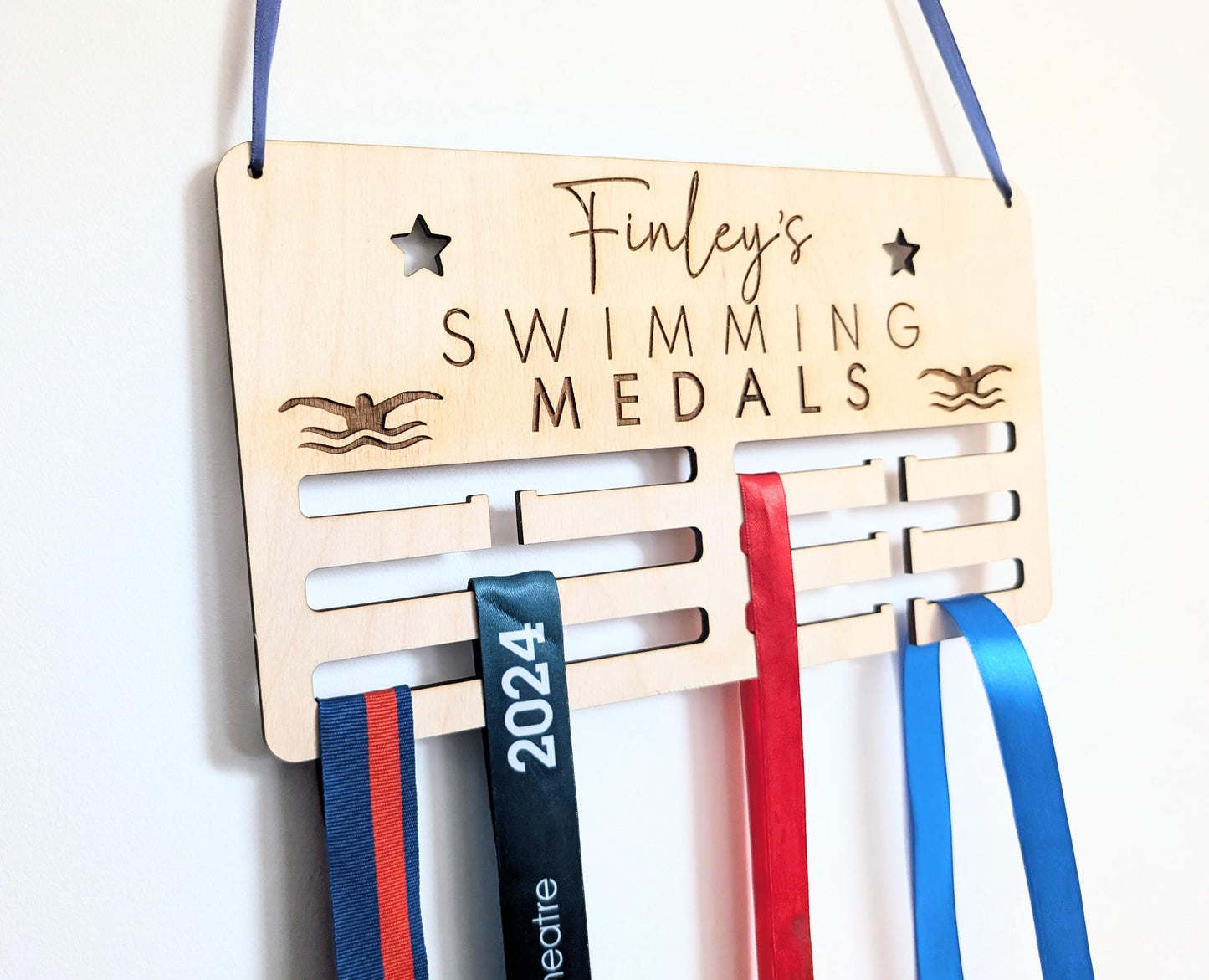 Personalised swimming medal holder. Wooden wall swimming medal hanger. Personalised swimming medal display. Medal holder for swimming medals